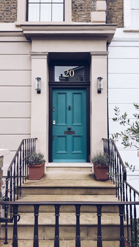 pintu rumah area depan teal